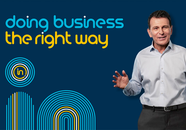 Intertek's CEO André Lacroix stands in front of a dark blue background next to the words 'doing business the right way'.