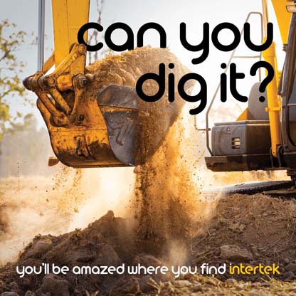 An excavator digging up soil
